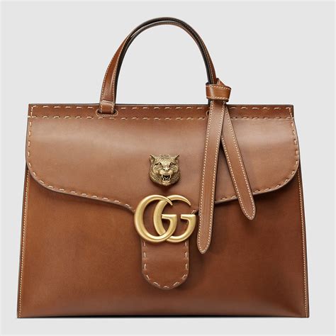 gucci leather goods.